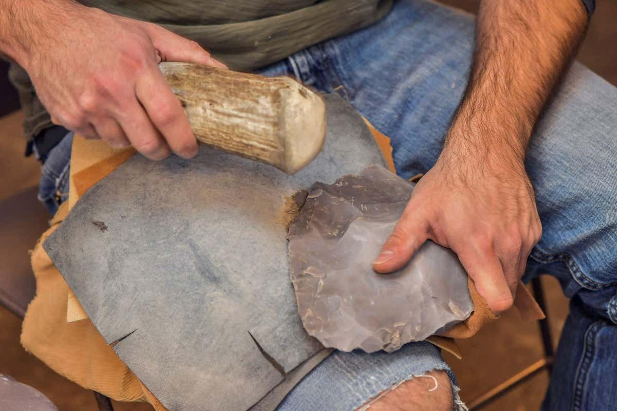 Metin Eren at Kent State University demonstrates flintknapping to make stone tools