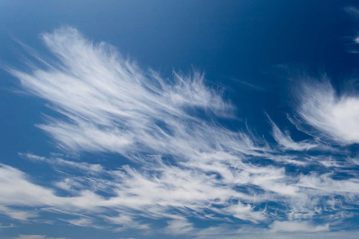 Wispy cirrus clouds in a clear blue sky